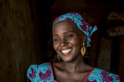 African woman holding an infant