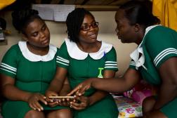 Girls demonstrating mobile app